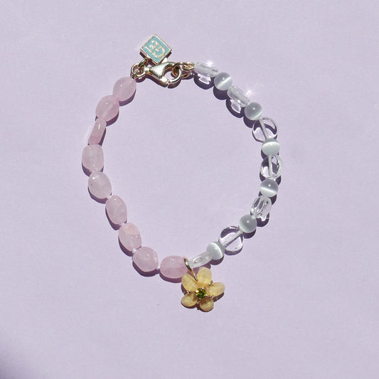 Pink Tone Bracelet with a Yellow Flower