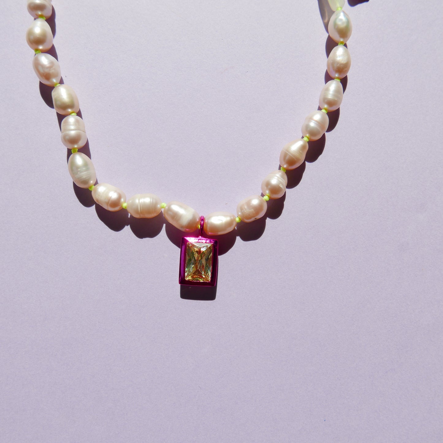 Pearl Necklace with Electric Pendants