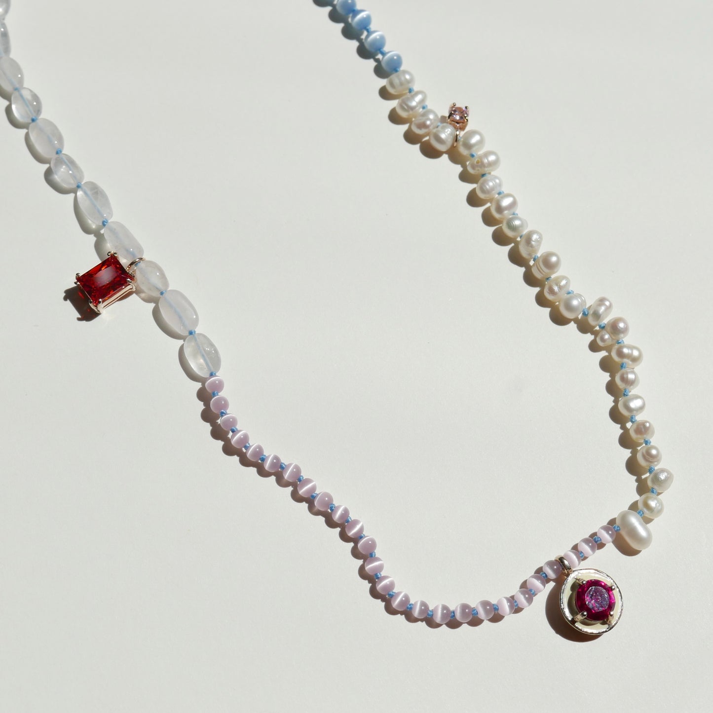 Light Tone Pearl Necklace with an Enamel Pendant