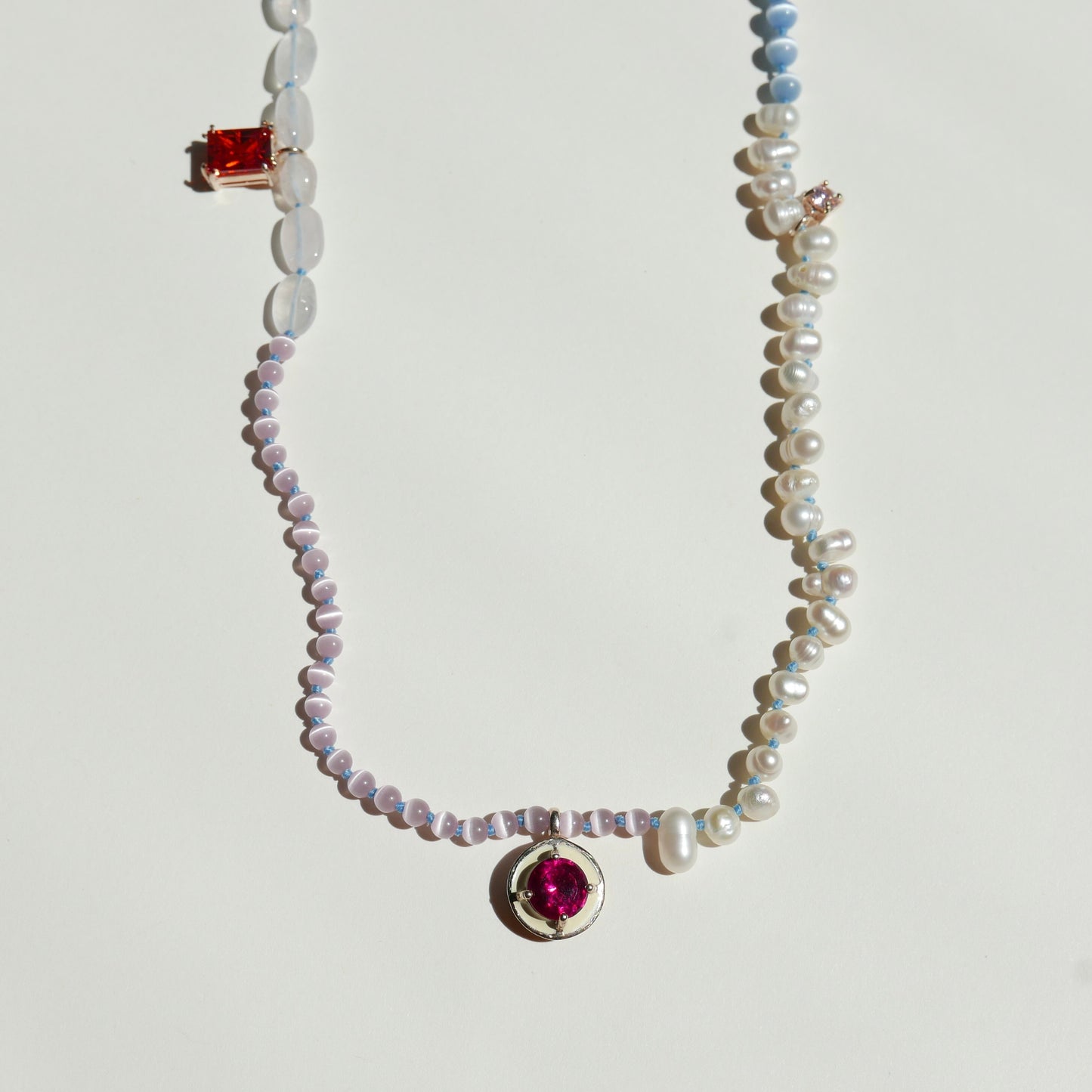 Light Tone Pearl Necklace with an Enamel Pendant