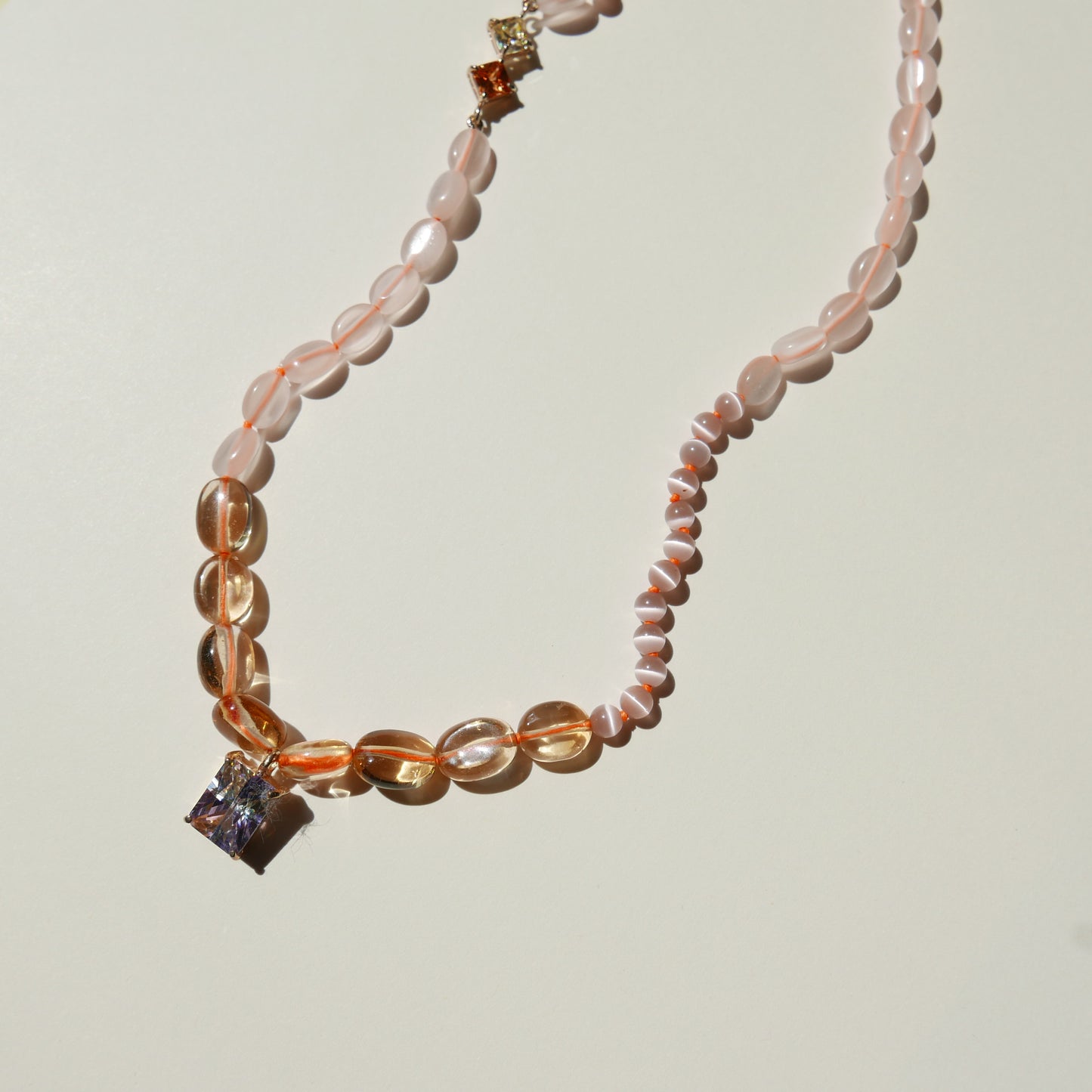 Orange Necklace with a Multi-Color Pendant