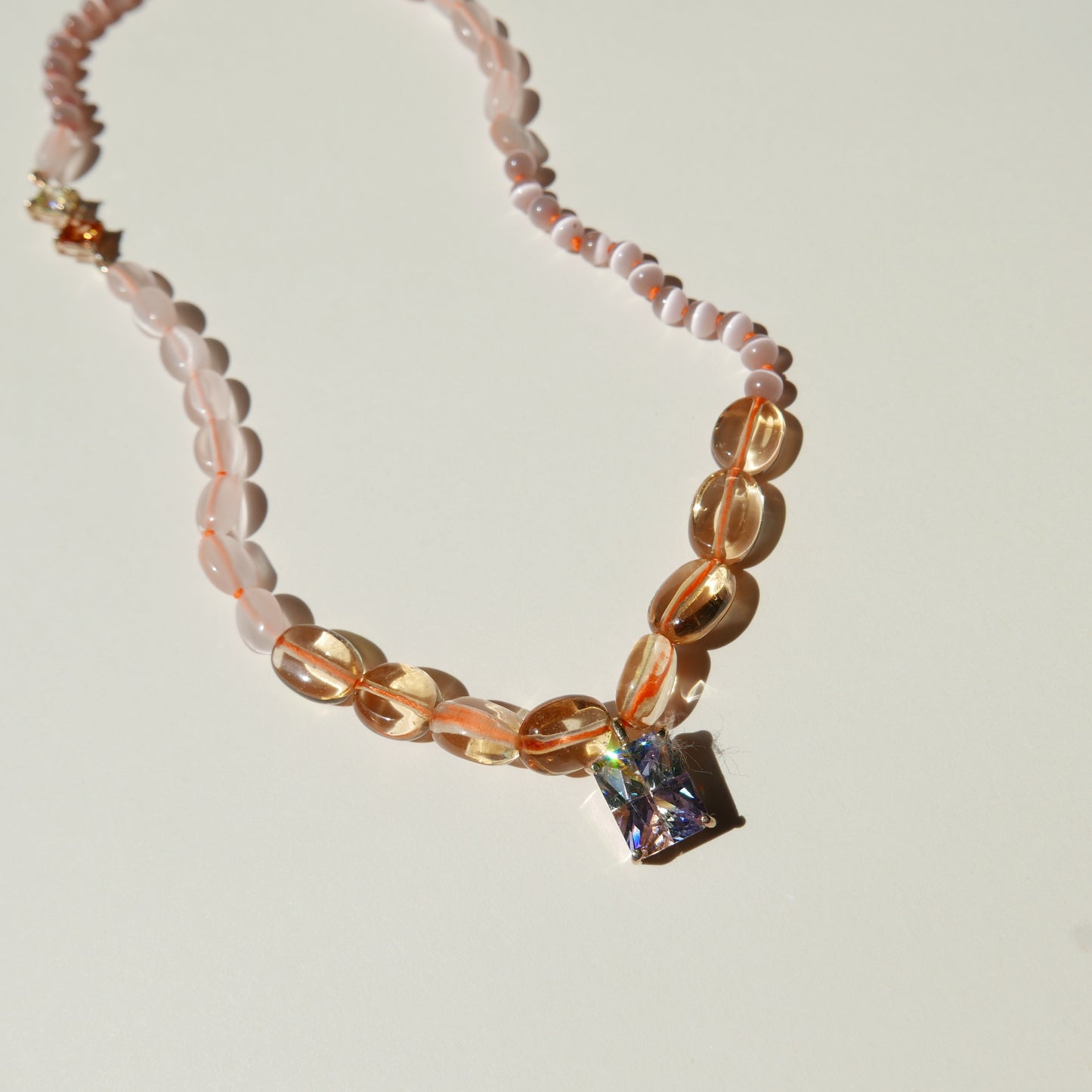 Orange Necklace with a Multi-Color Pendant