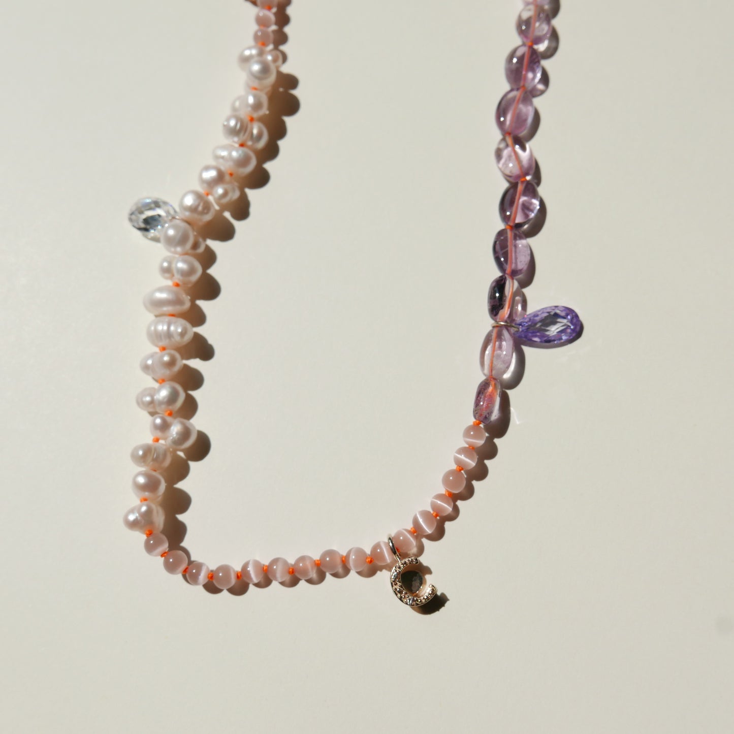 Purple Pearl Necklace with a "C"