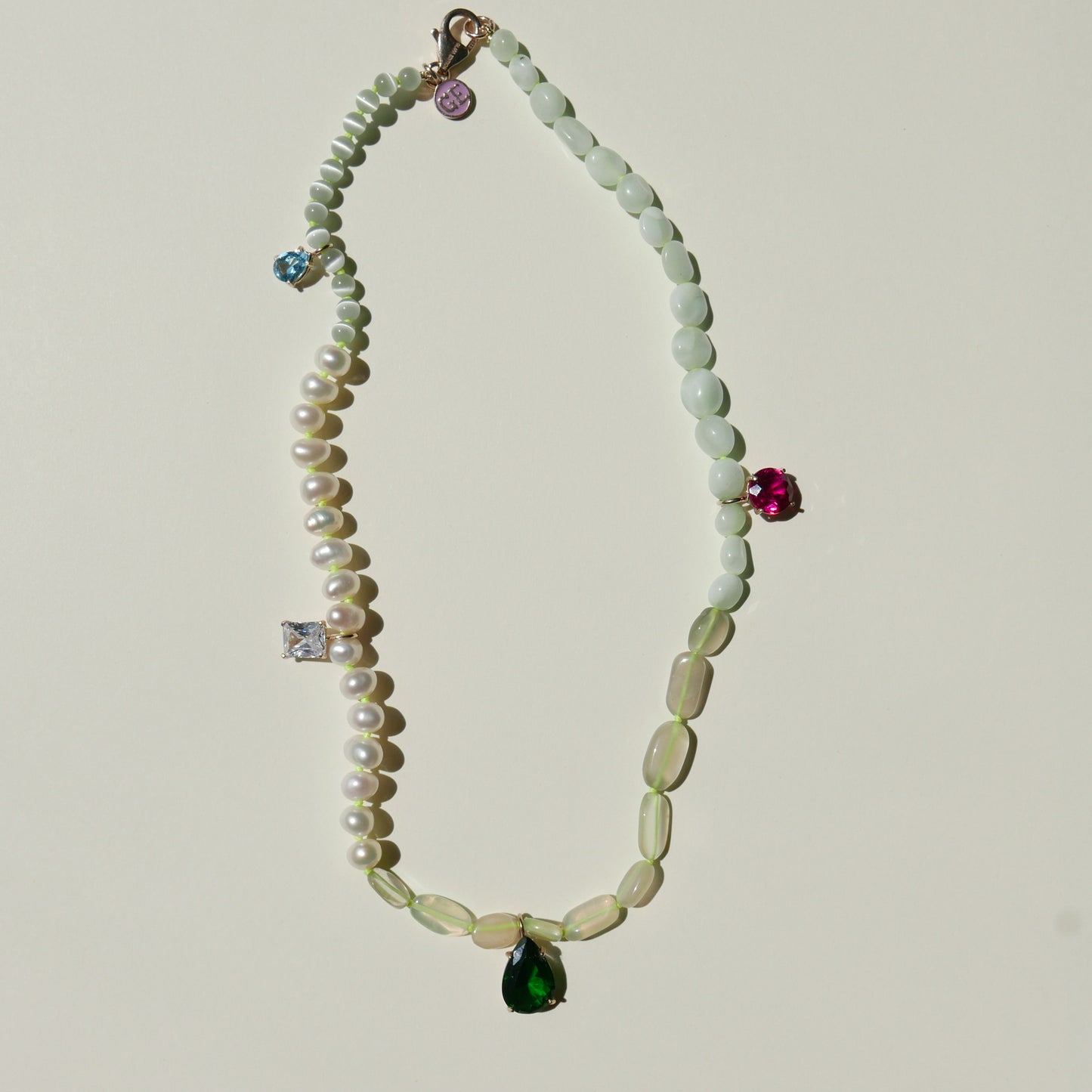 Pearl Necklace with a Green Pendant