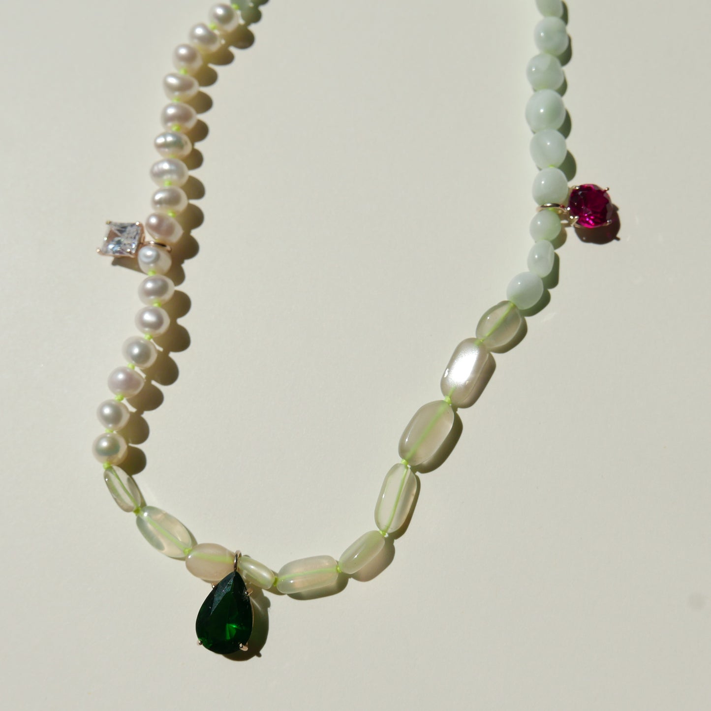 Pearl Necklace with a Green Pendant