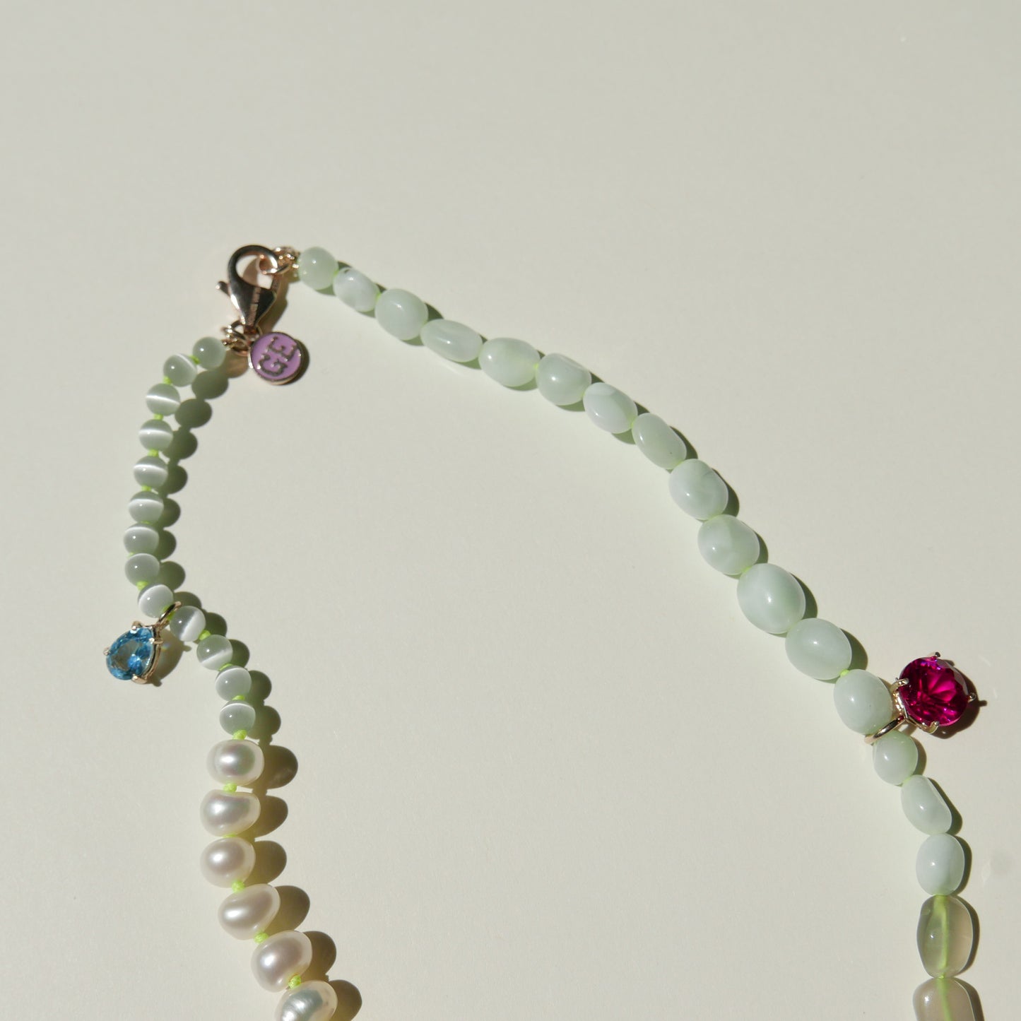 Pearl Necklace with a Green Pendant