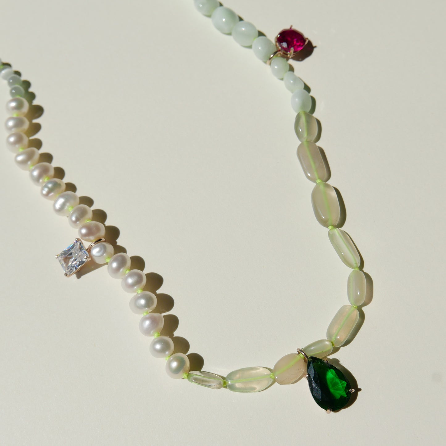 Pearl Necklace with a Green Pendant