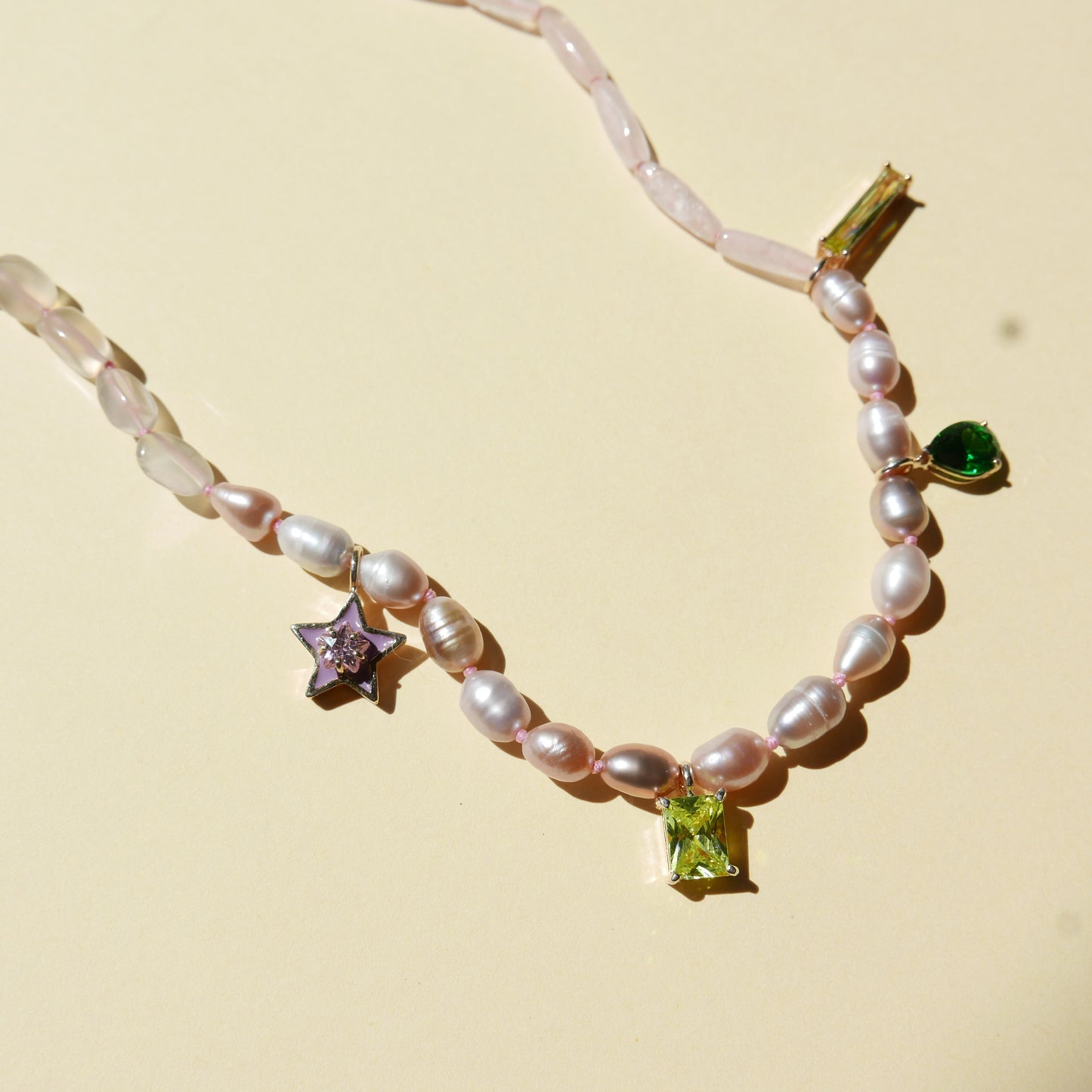 Light Tone Pearl Necklace with an Enamel Star