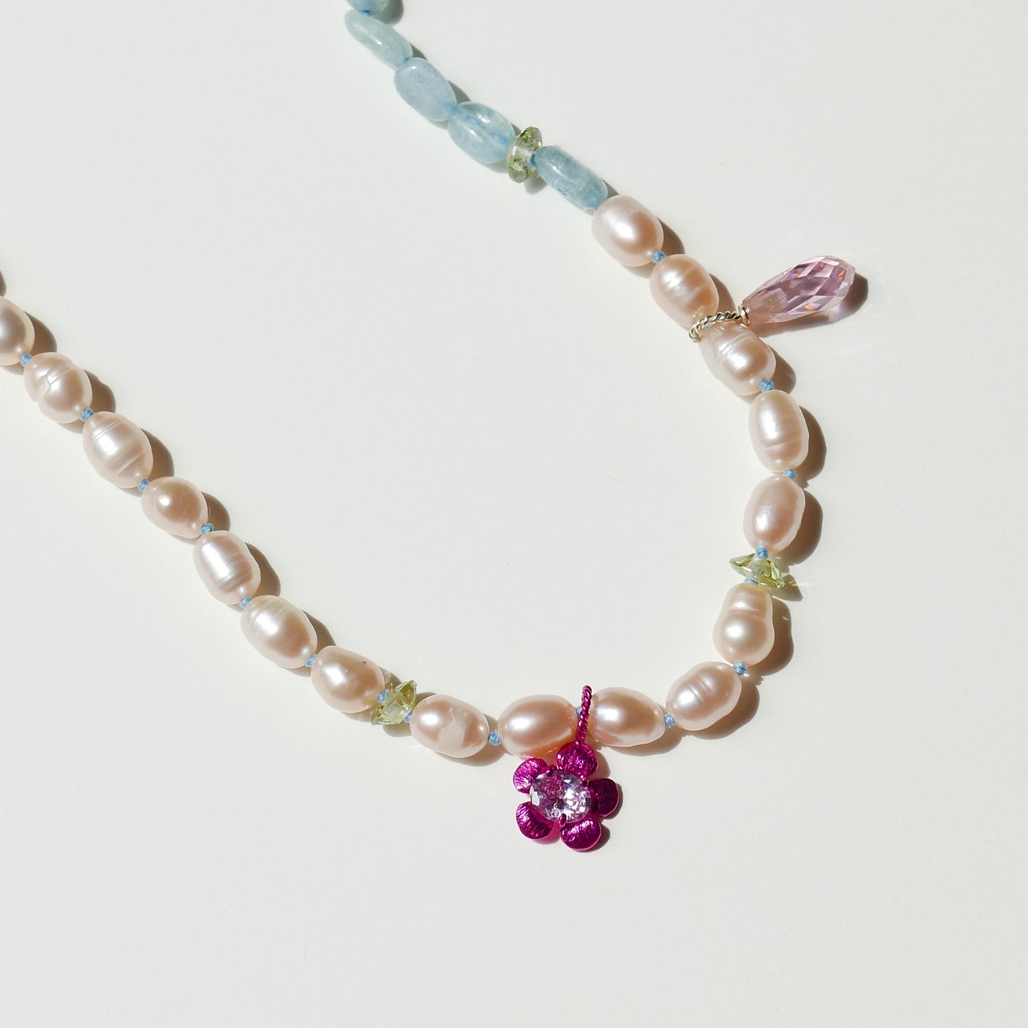 Light Tone Pearl Necklace with an Electrifying Flower